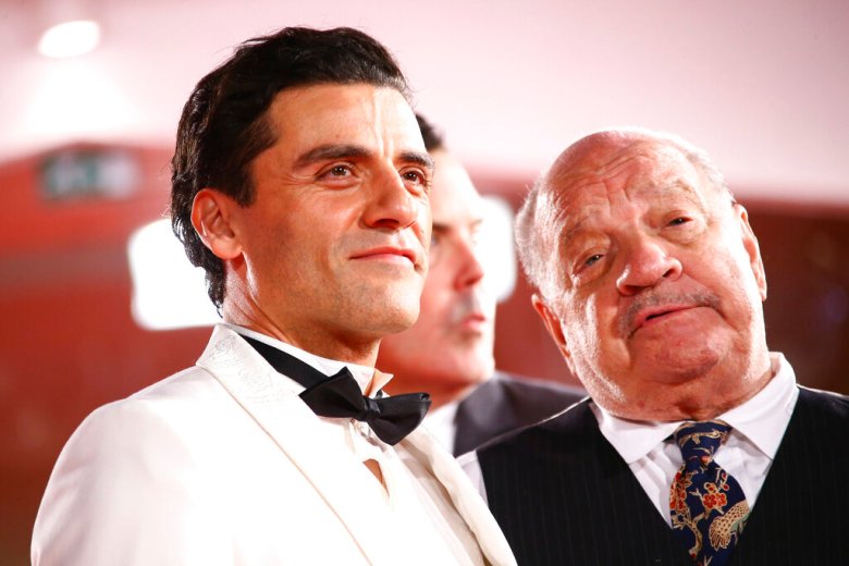 Oscar Isaac and Paul Schrader pose for photographers upon arrival at the premiere of the film 'The Card Counter' during the 78th edition of the Venice Film Festival in Venice, Italy, Thursday, Sep, 2, 2021. (Photo by Joel C Ryan/Invision/AP)